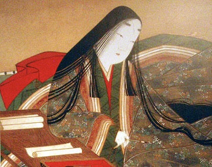 書物を前にした女性の姿を描いた日本の絵画。伝統的な衣装を纏い、静かに筆を持っている。
