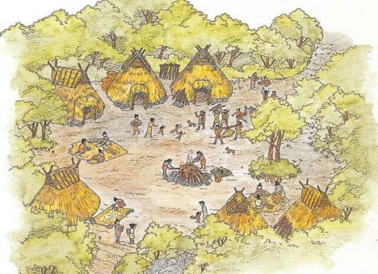 石造の家と人々が集まる集落の風景。周囲には木々が茂り、村の中心で活動する人々が描かれている。